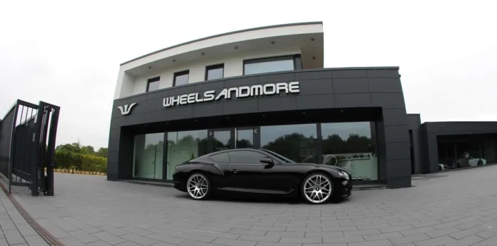 bentley-chiptuning fisheye view bentley new continental gt by wheelsandmore in from of headquarter in germany