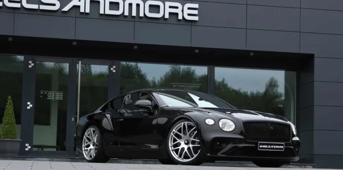 bentley-engine-tuning front side view of bentley new continental gt 3s in front of wheelsandmore headquarter