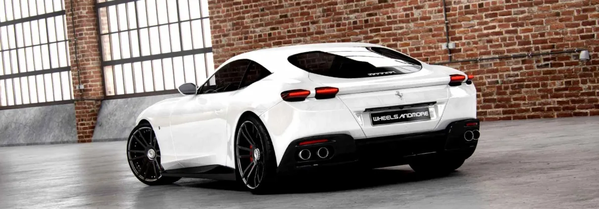 rear view of white ferrari roma waering individual customized fiwe wheels from wheelsandmore