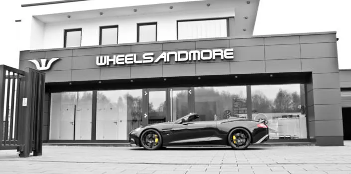 side view black vanquish with 21 inch wheels