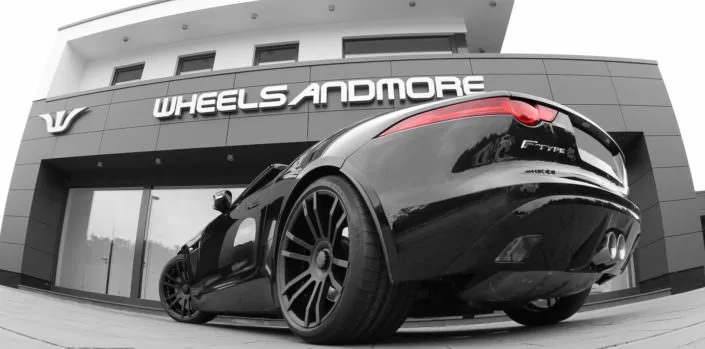jaguar f-type with 20 inch tuning wheels fiwe and lowering suspension springs