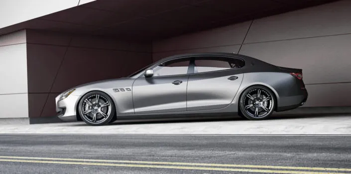 quattroporte tuning side view with black 22 inch 6sporz rims