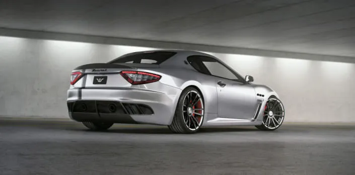 rear view of fiwe wheels on silver maserati