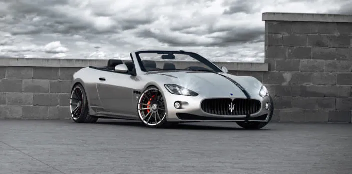 fron view on conversed maserati gran cabrio with fiwe wheels in 21 inch and coliover suspension