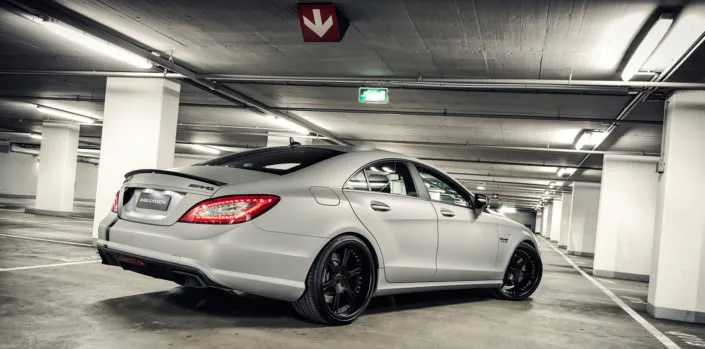 all black 20 inch 6sporz wheels on grey cls63amg in garage