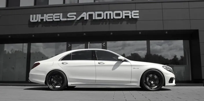 side view mercedes s63 amg white with black wheels