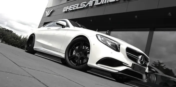 whit s63amg coupe with 22 inch 6sporz wheels in matte black